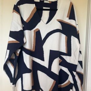 Navy beige and gold sweater with side slits